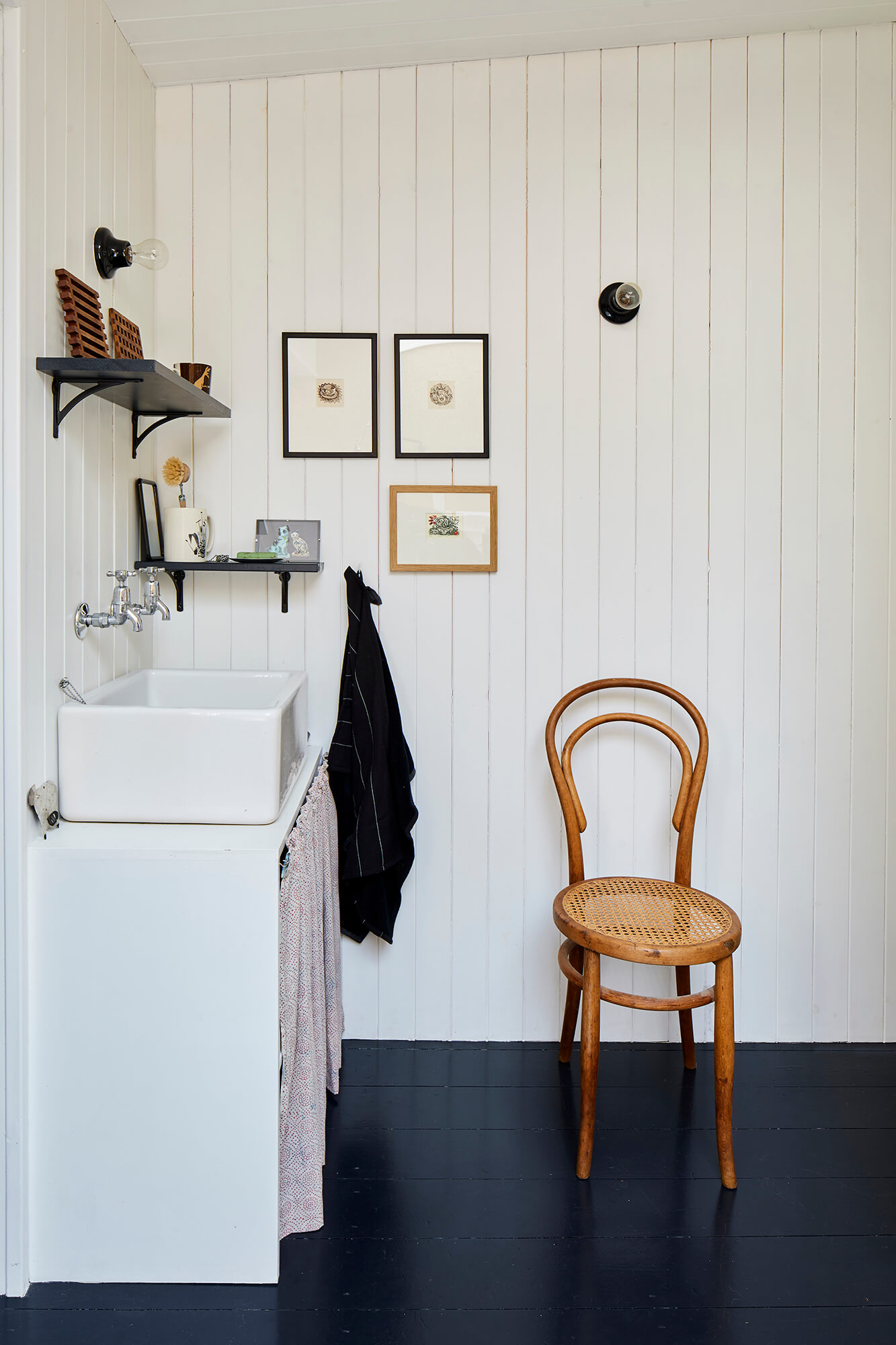 Utility room with white butler sink