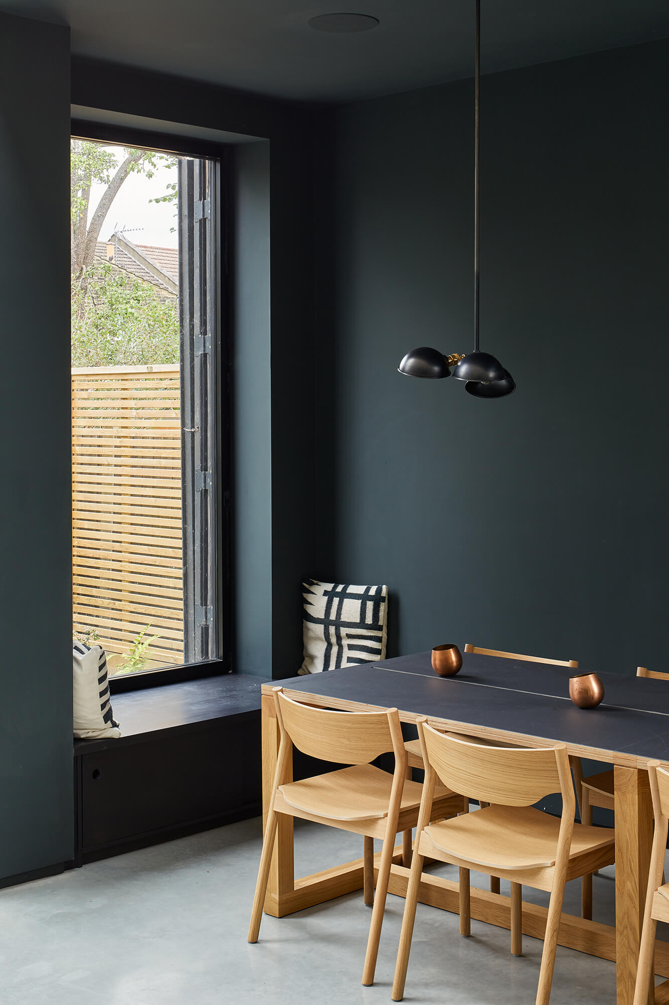 Dining area with dark green walls