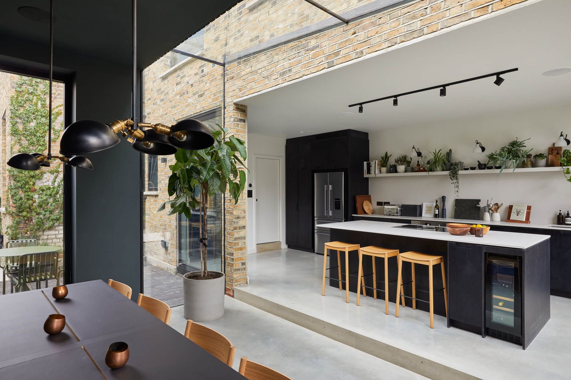 Contemporary kitchen with black cabinets